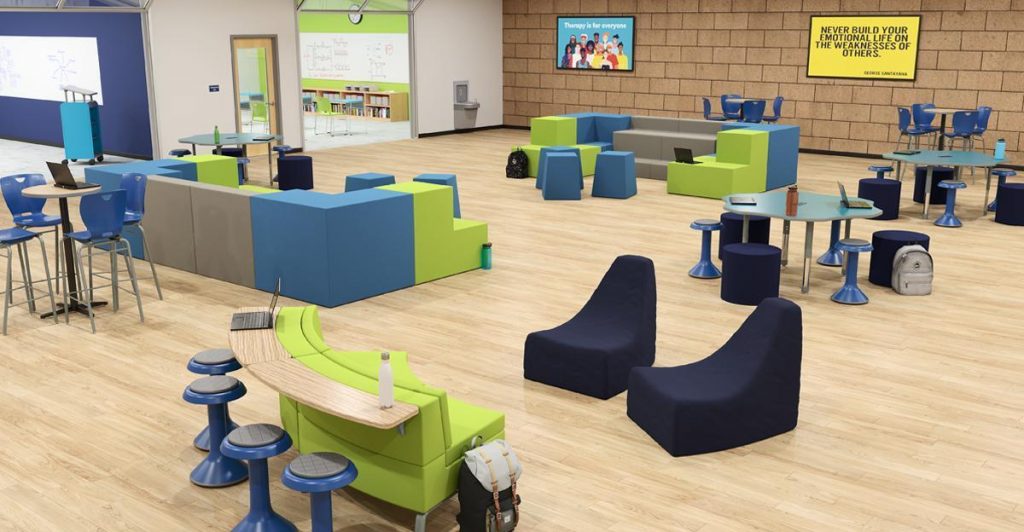 Flexible learning space with modular seating, open layout, and areas designed for movement and collaboration.