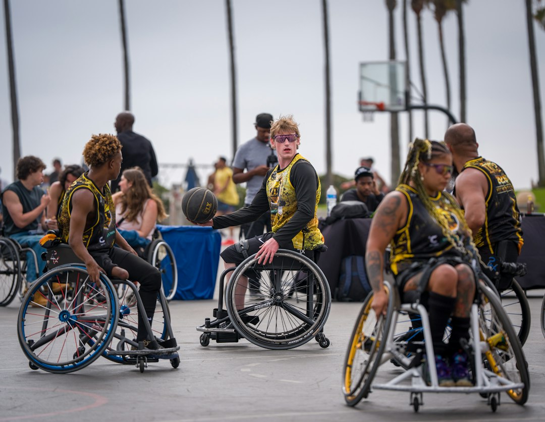 Wheelchair basketball players competing on an outdoor court